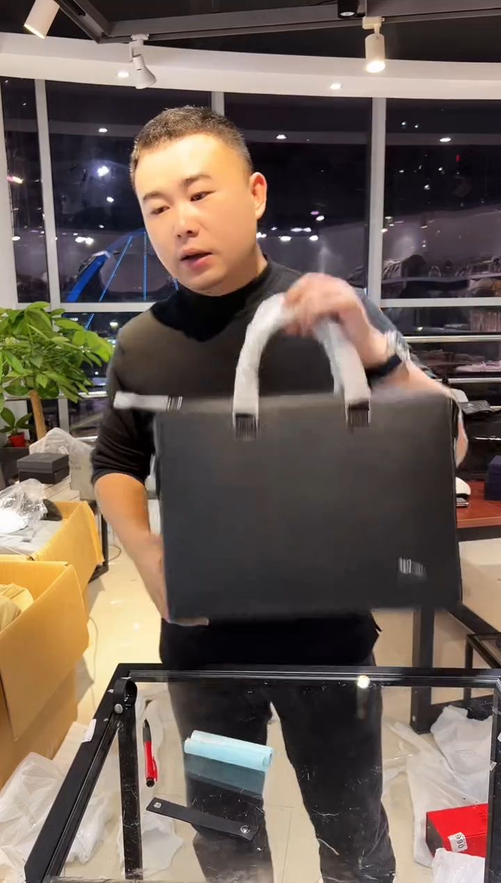 头层牛皮韩爵绅士包包皮具991