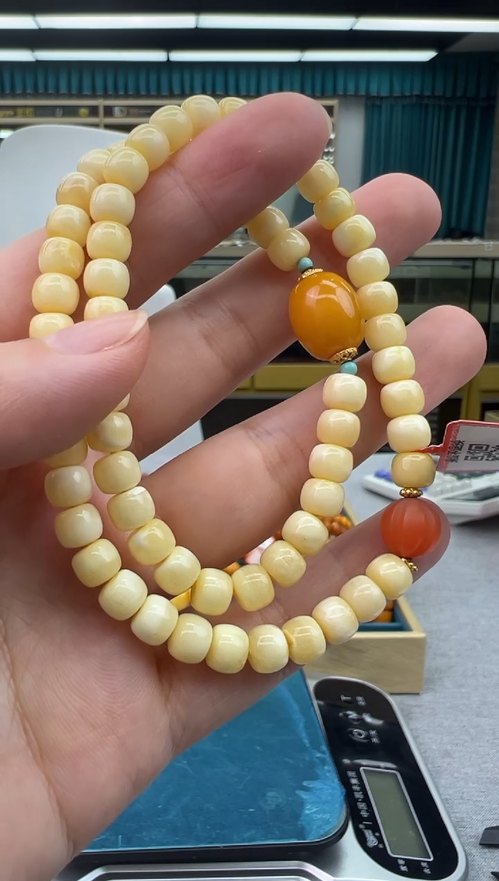 未镶嵌琥珀手链56秒拍号 假一罚三