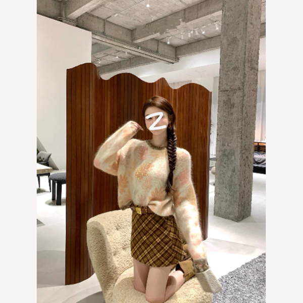 小众复古设计感拼色毛呢不规则格纹包臀短裙女2025早秋新款a字裙