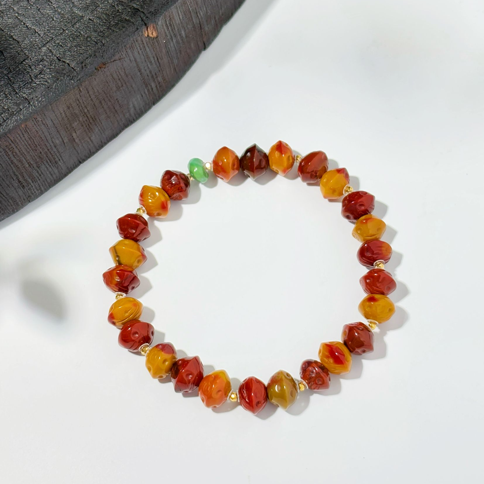 18k金原矿包浆百香籽南红手串8mm±.多样发其一