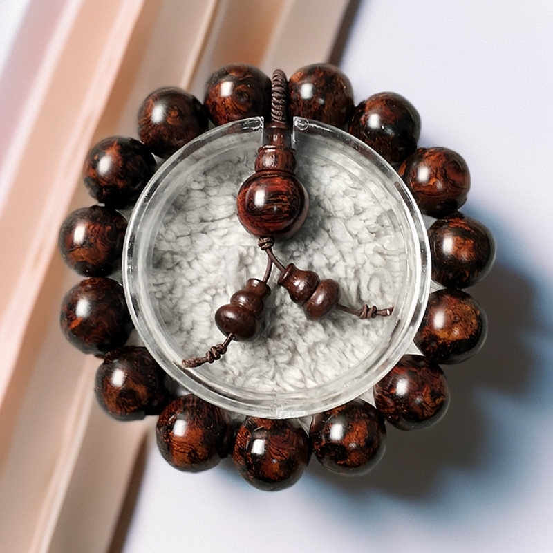 老挝黄花梨1.5黑金太阳花手串