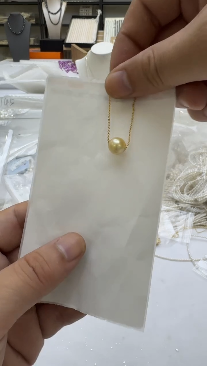 18K金镶嵌海水珍珠吊坠(赠链)10mm 金珠路路通