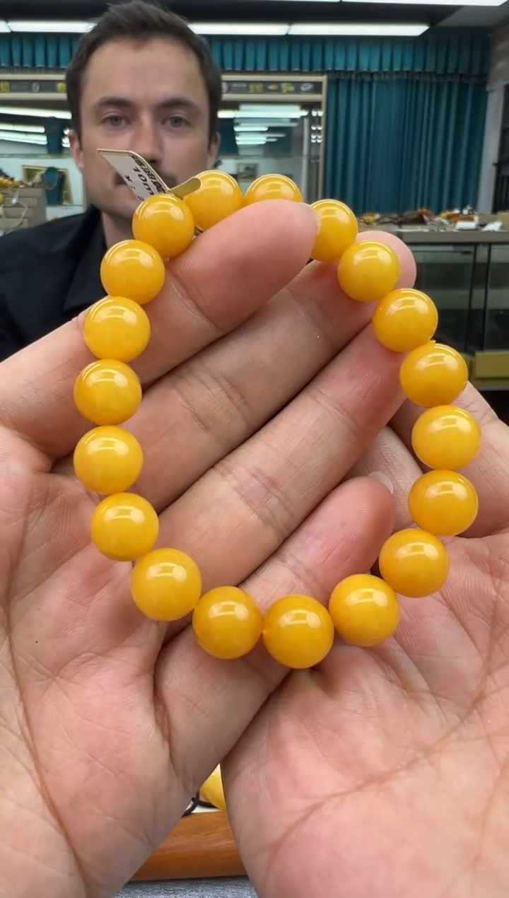 未镶嵌琥珀手链11秒拍号 假一罚三