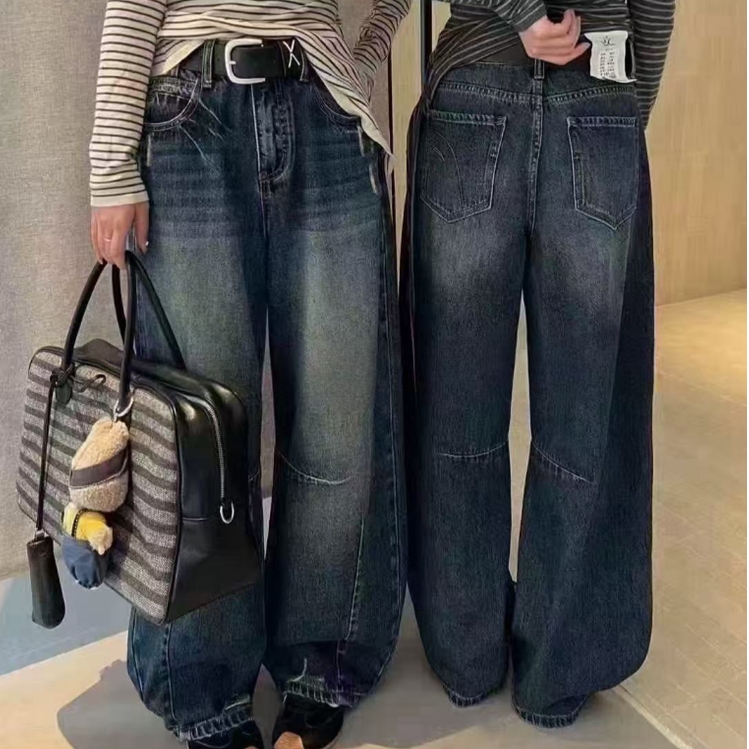 2025年秋季新款百搭休闲破洞宽松显瘦磨破弯刀裤牛仔裤86703