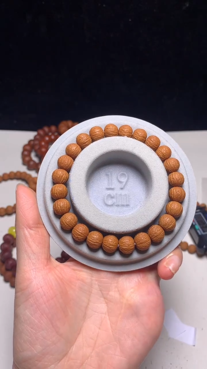 手串猴头核桃白*10＋麒麟纹凤羽