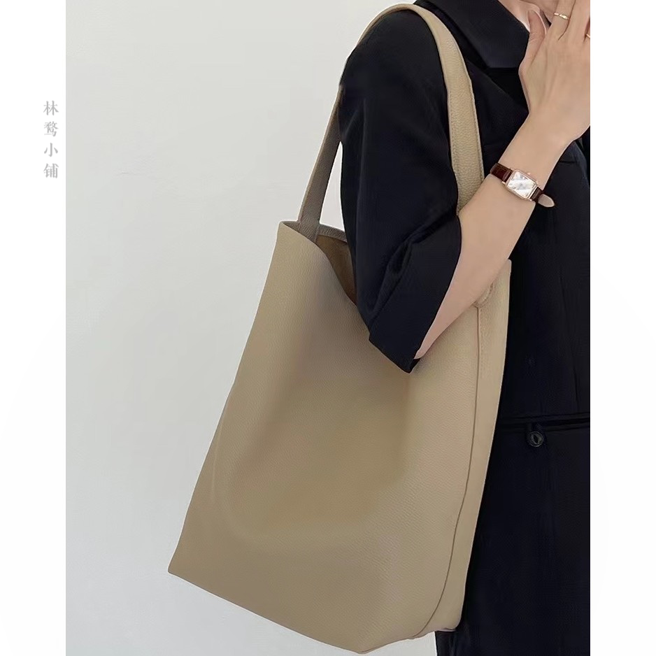 设计师定制款2025单肩包大容量水桶包简约百搭通勤女士包包