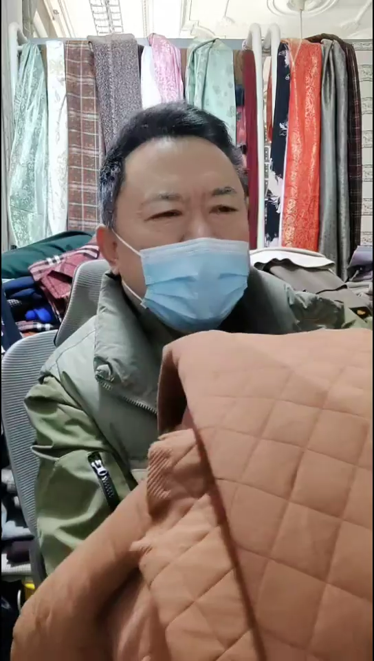 焦糖色棋子格图案布料