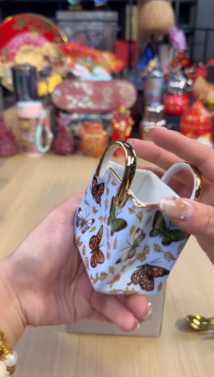 51蓝色蝴蝶提包收纳罐