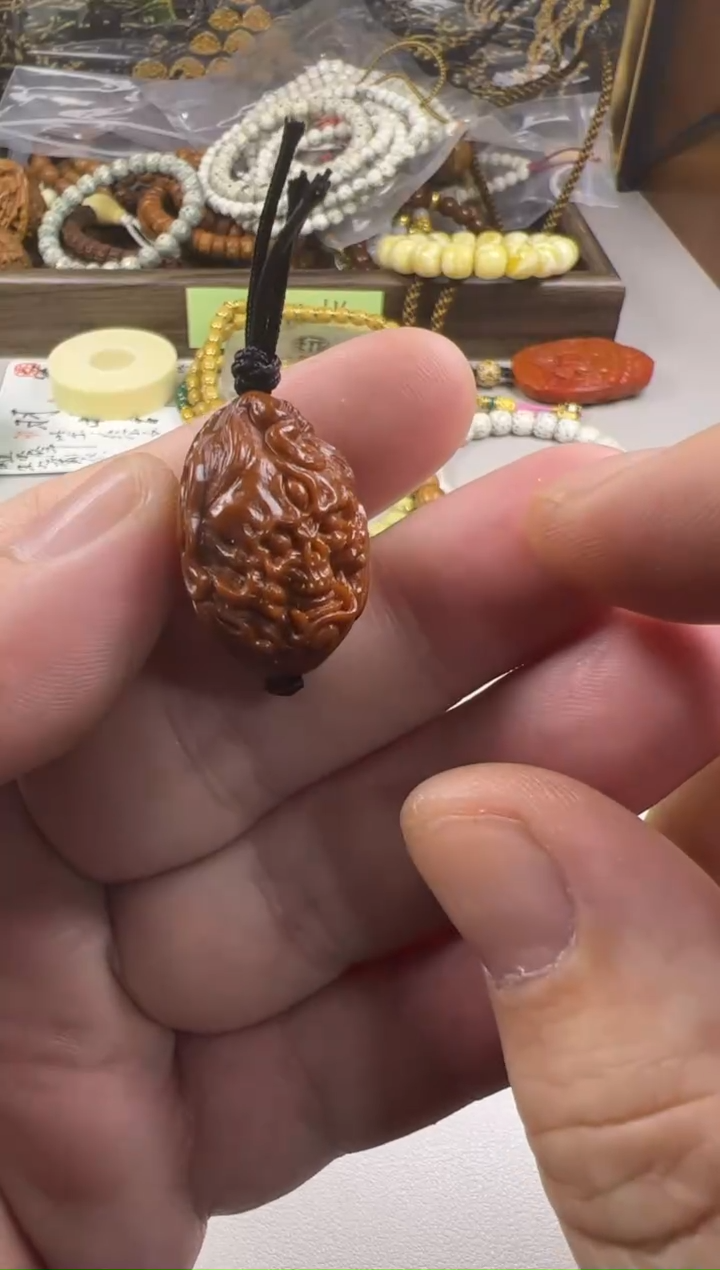 把件橄榄核滴**聪0001225585899666