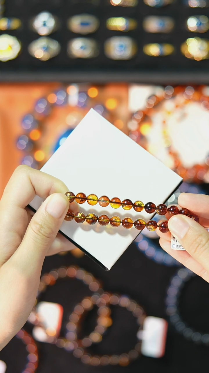 【闪购商品】琥珀裸石未镶嵌7mm金沙红蓝单圈