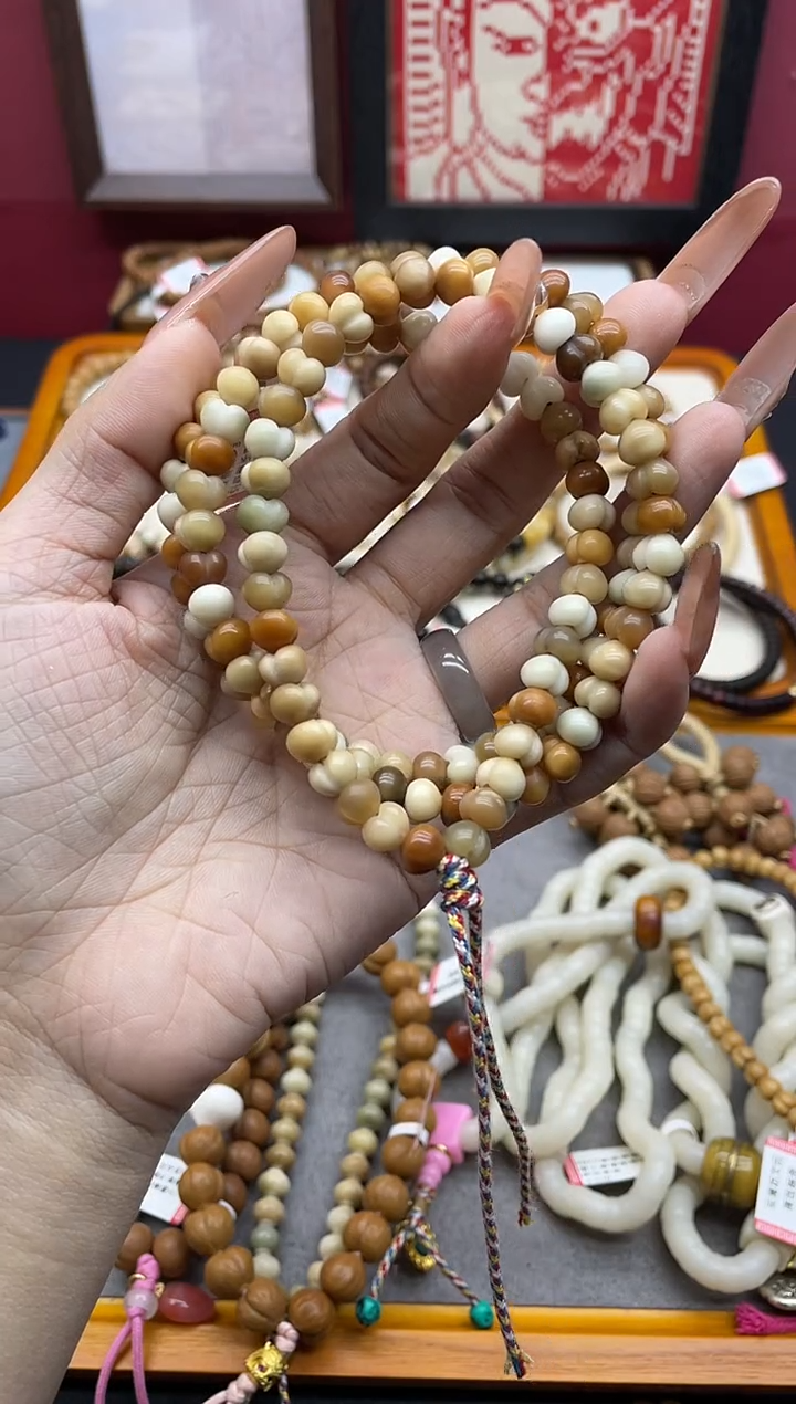 手串龙脊菩提关****）龙脊菩提多宝雕刻爱心屁桃长串手串
