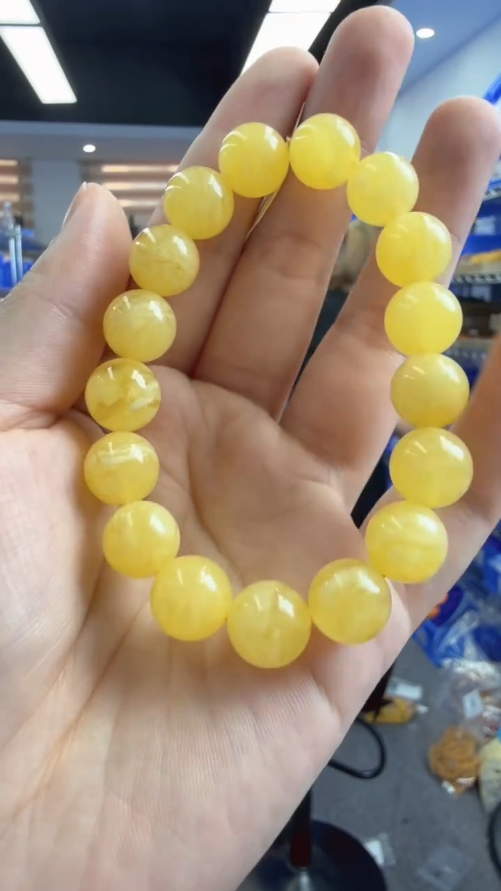 未镶嵌琥珀手链40秒拍号 假一罚三