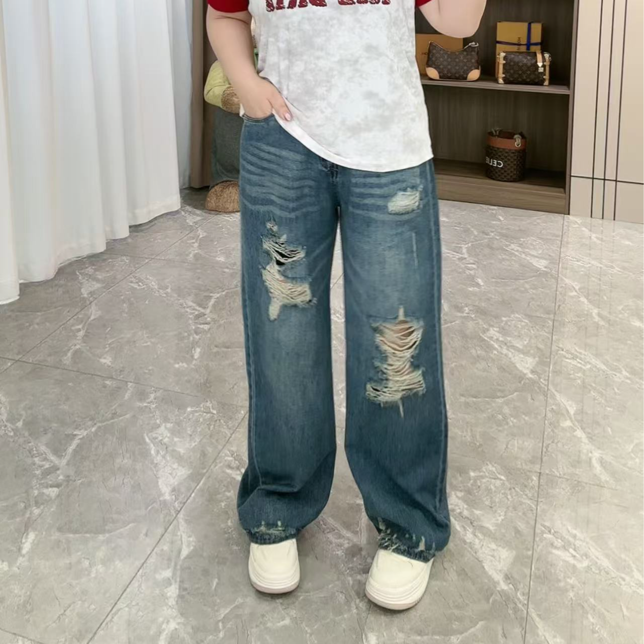 8120欧货薄款破洞窄版牛仔裤
