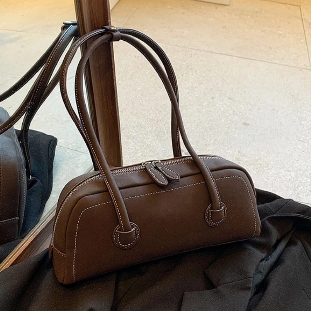 2025新款女士手拿包ccc