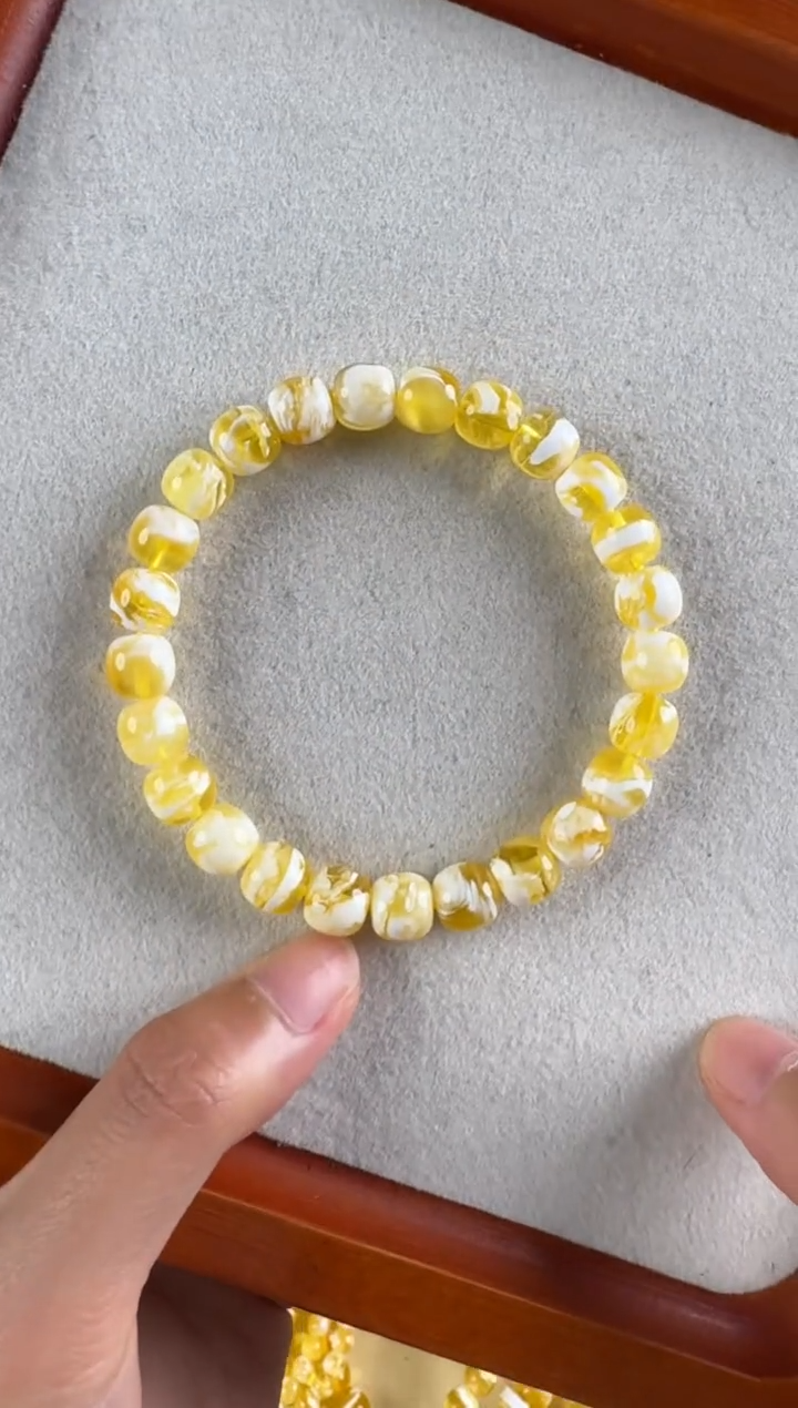 未镶嵌琥珀裸石8.5mm金漆白虎皮