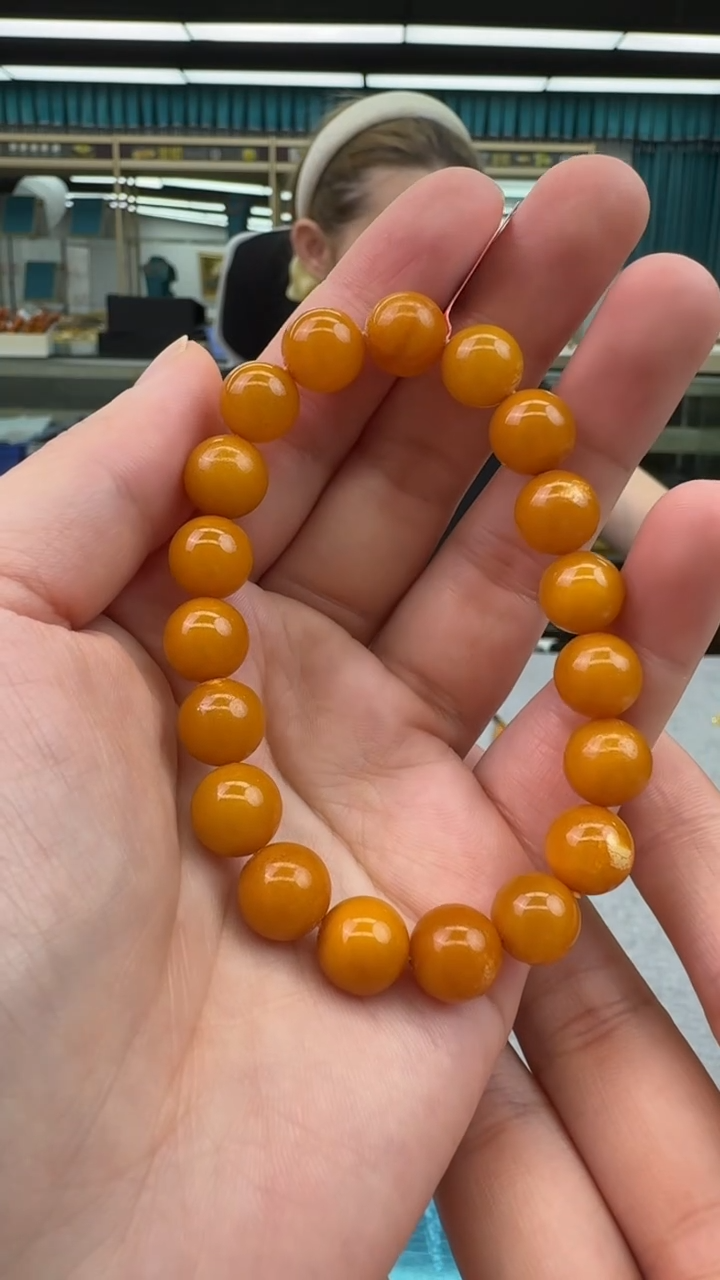 未镶嵌琥珀手链4秒拍号 假一罚三