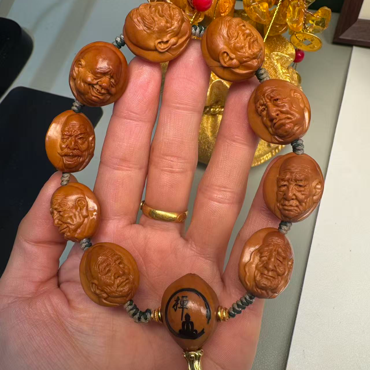 手工雕刻橄榄核手串双面罗汉