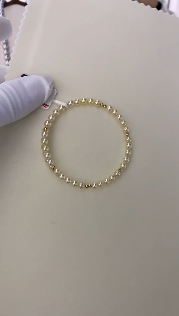 18K金镶嵌手镯海水珍珠羽皇金弹力手镯 4-5mm 18K金 