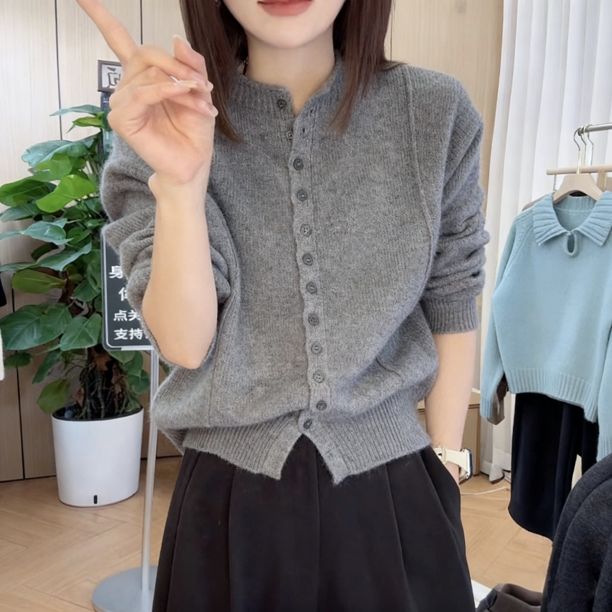 2025年秋冬新款立领卷边长袖针织衫开衫女时尚宽松休闲百搭上衣