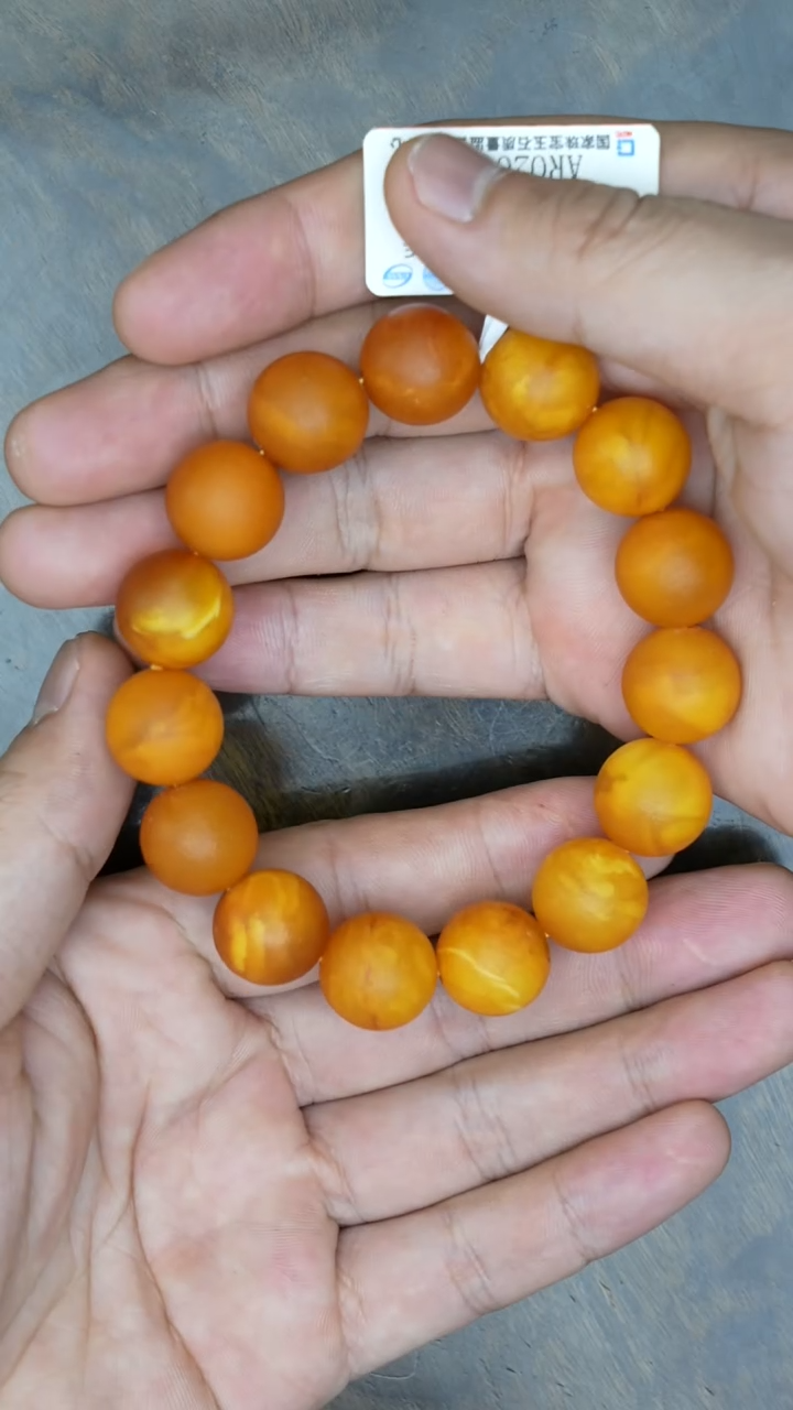 【闪购商品】琥珀裸石未镶嵌老蜡橘皮圆珠手串微瑕