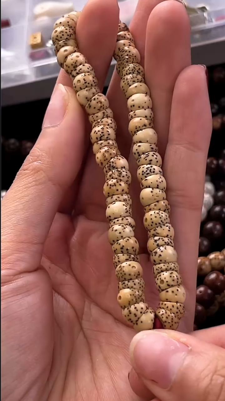 手串星月菩提金*金花皮大肠7*5手持
