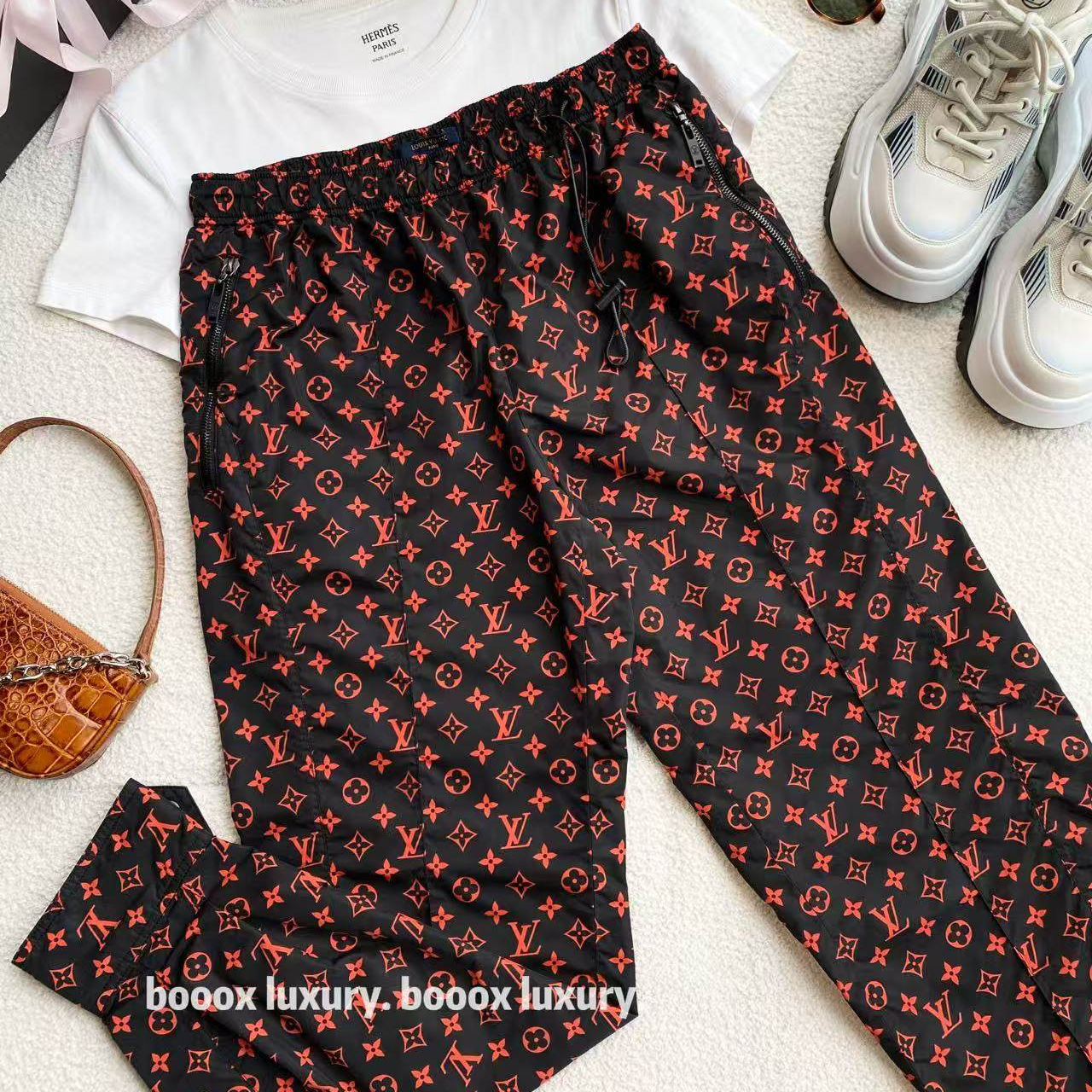 95新 LouisVuitton/路易威登 zz552 老花满印慢跑裤 36码轻微磨损