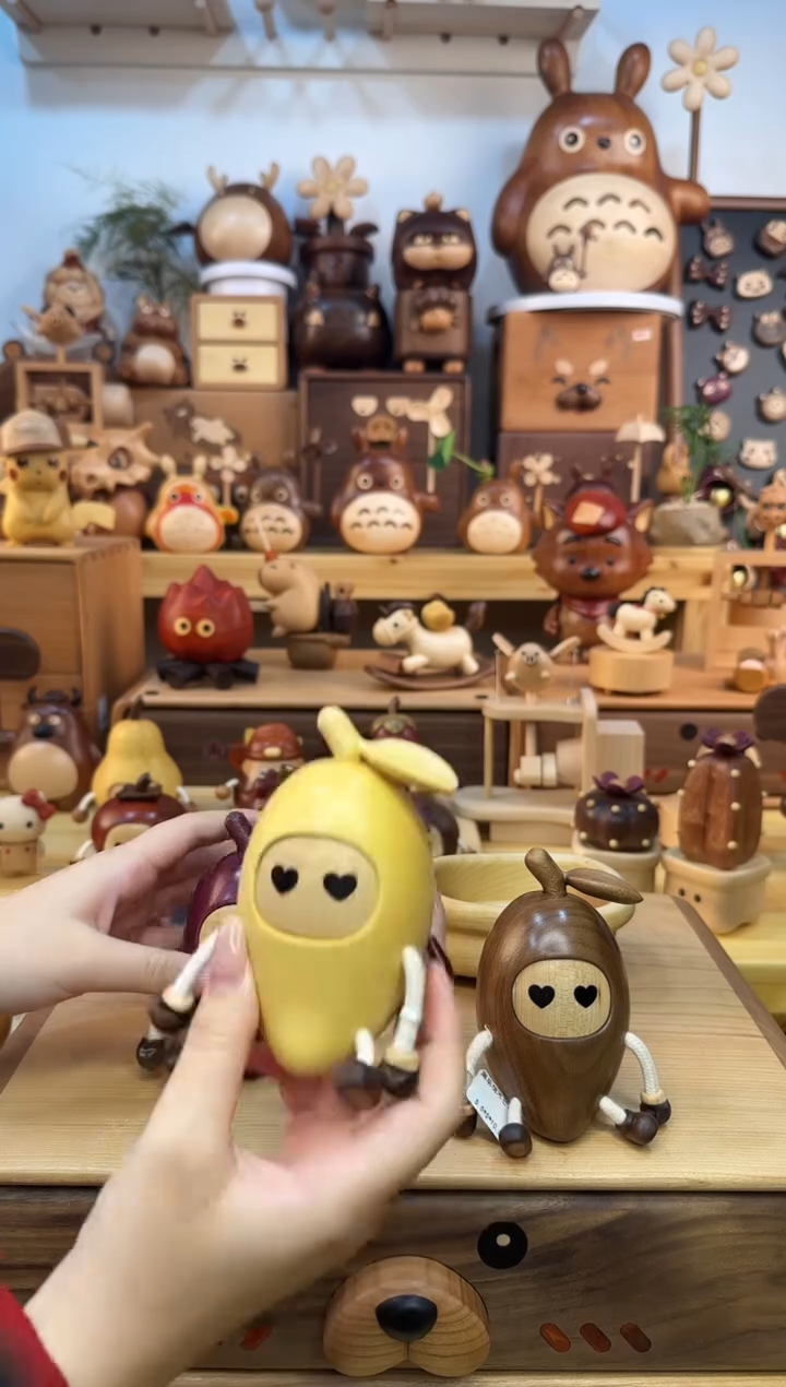 木芒果人三个摆件