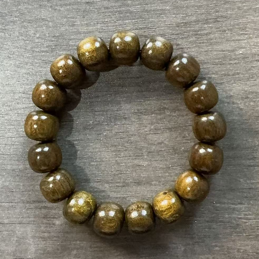 A249金丝楠木乌金料卡1.3老型桶珠单圈手串