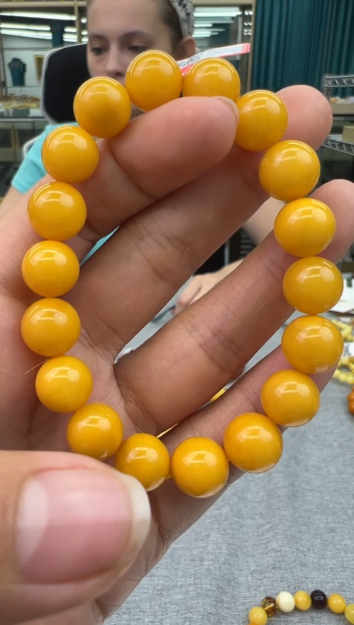 未镶嵌琥珀手链64秒拍号假一罚十