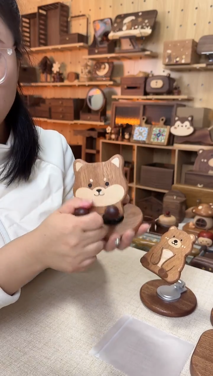 木乌檀木实木柴犬手机支架