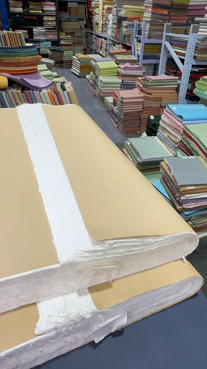 用****8纯手工四尺整张100张楮皮白云龙 其中50张裁对开 7斤那个