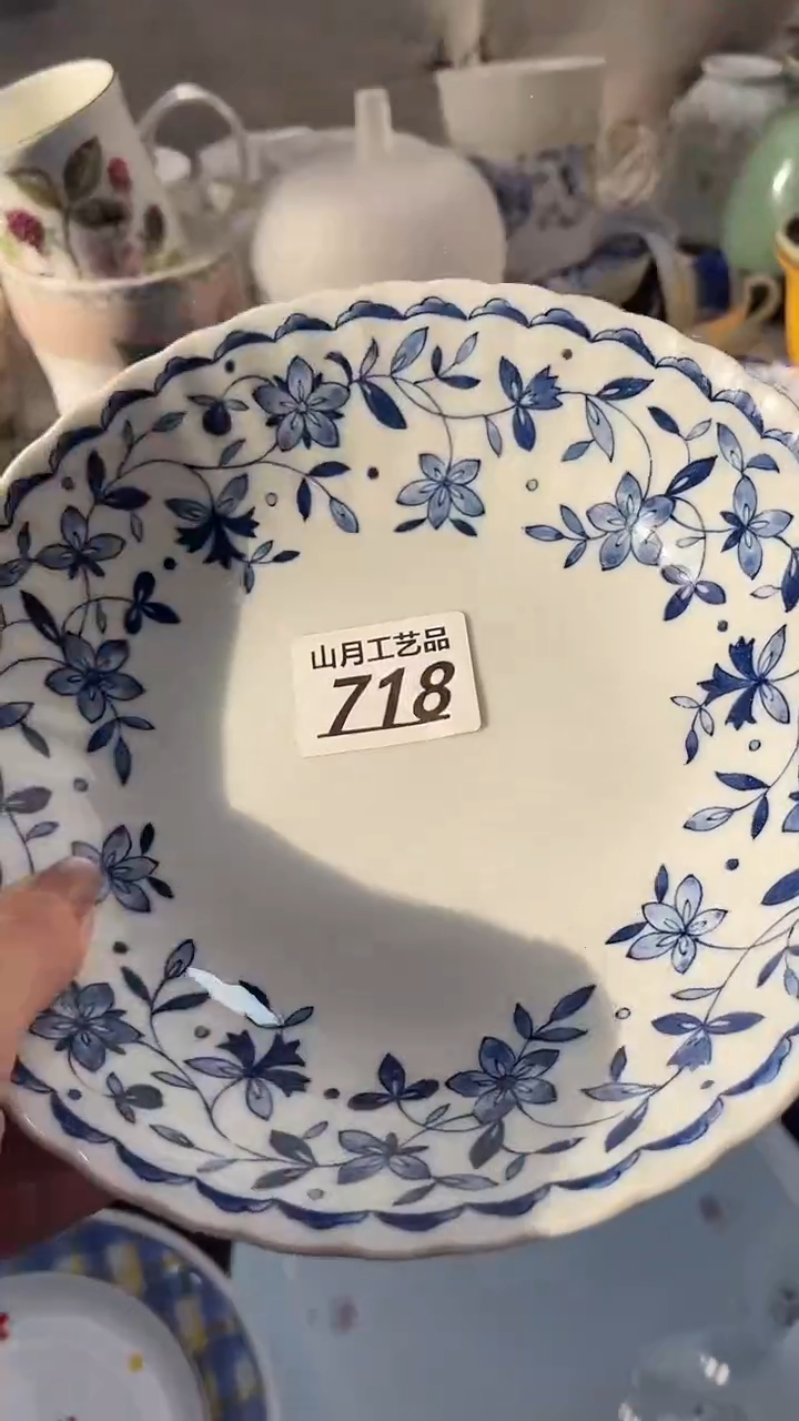 瓷片Z****里718            