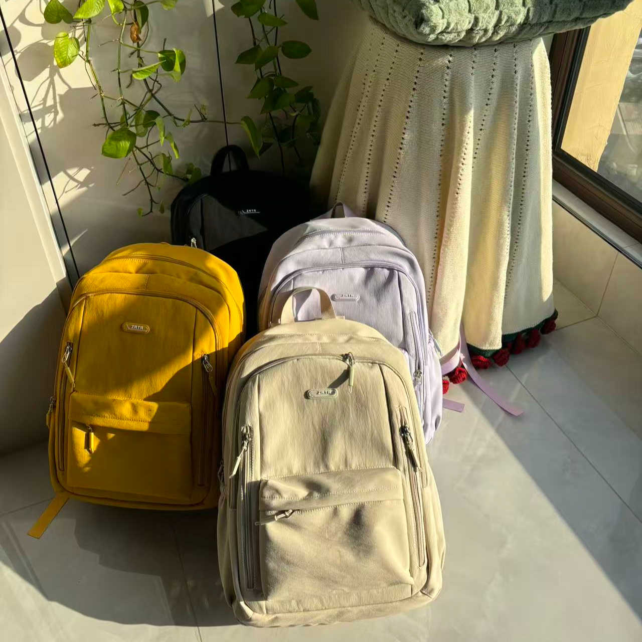 左拉防震防盗双肩包日系百搭潮流休闲韩版轻便双肩背学生时尚ins