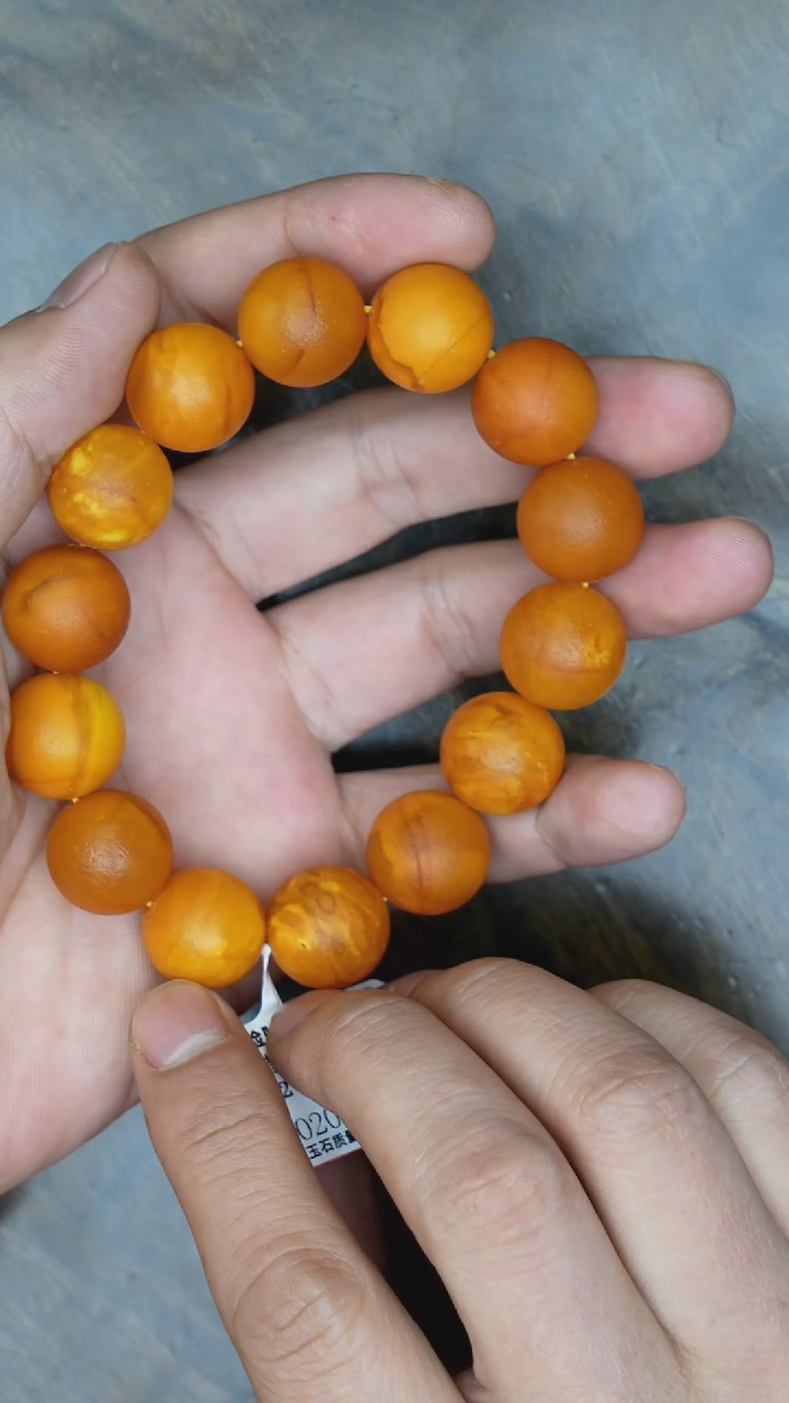【闪购商品】琥珀裸石未镶嵌老蜡橘皮圆珠手串微瑕