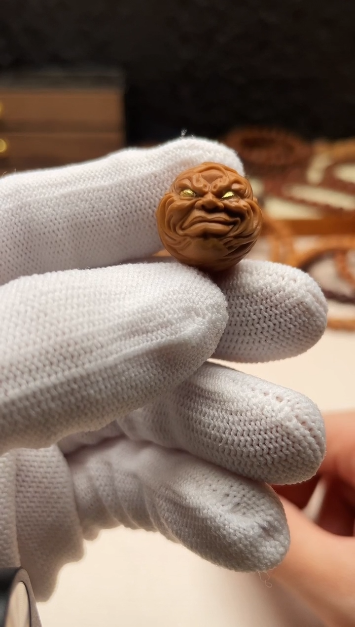 吊坠猴头核桃镶金单颗不屑一顾