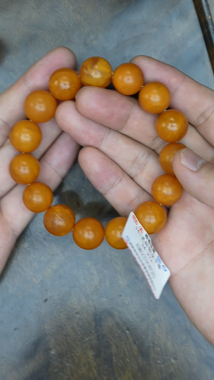 【闪购商品】琥珀裸石未镶嵌老蜡圆珠橘皮手串微瑕