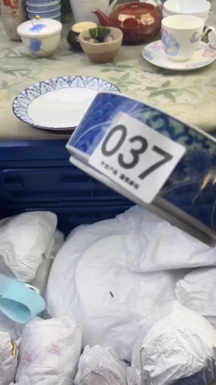 瓷片胖****享037........