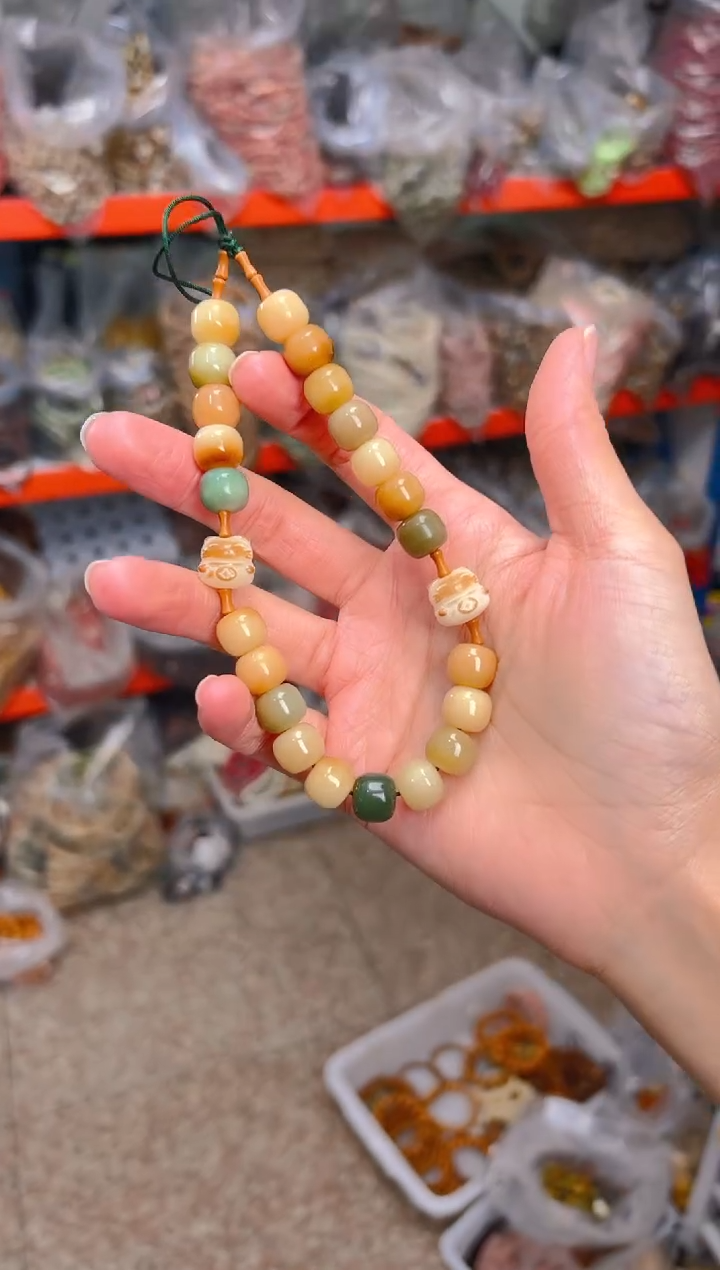 吊坠菩提根/象牙果竹节手机链