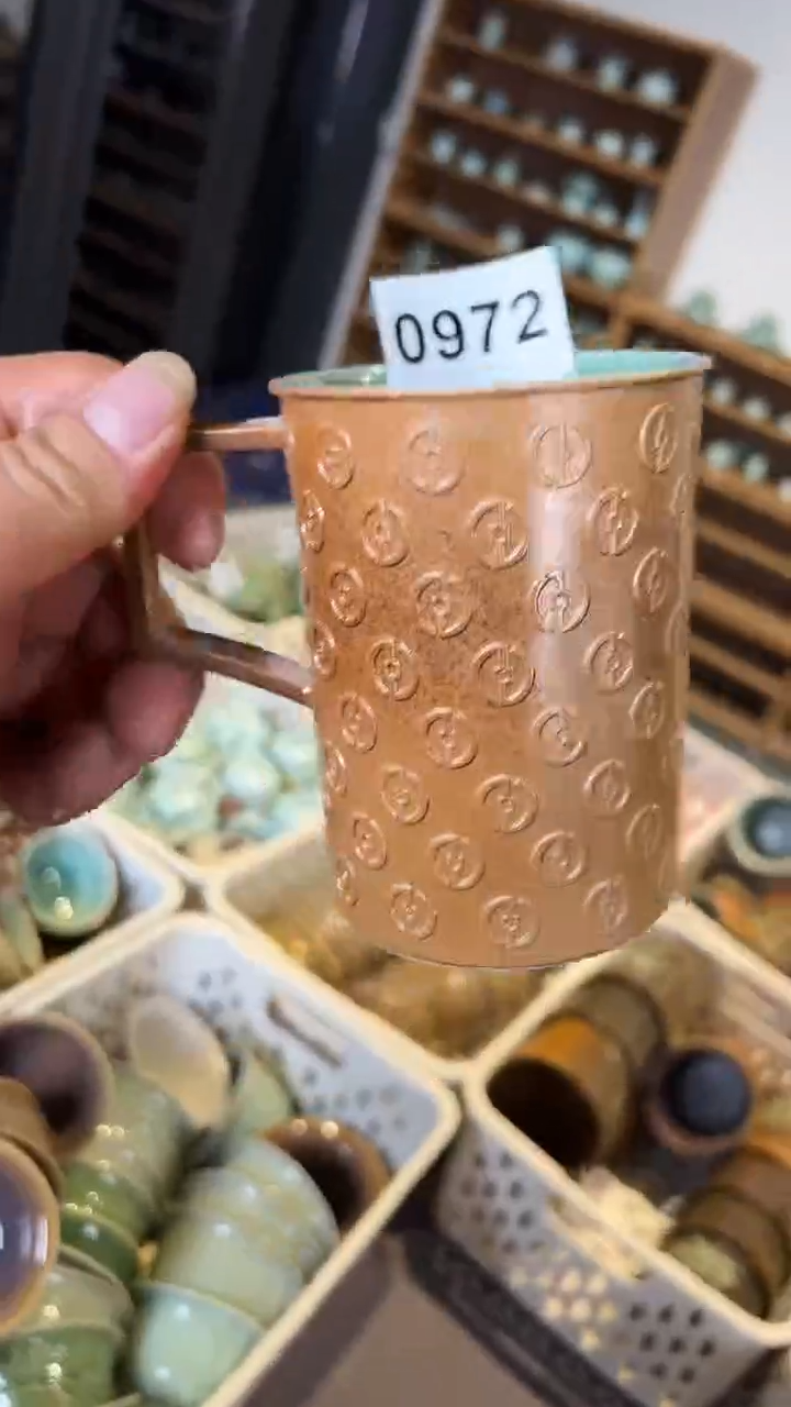 沧****1龙泉窑草木灰双釉奶茶杯0974