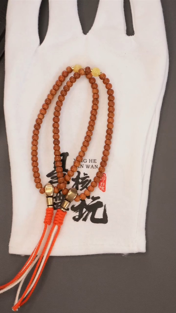 橄榄核把件｛福利款｝5.0mm老挝红核手持微三花印记