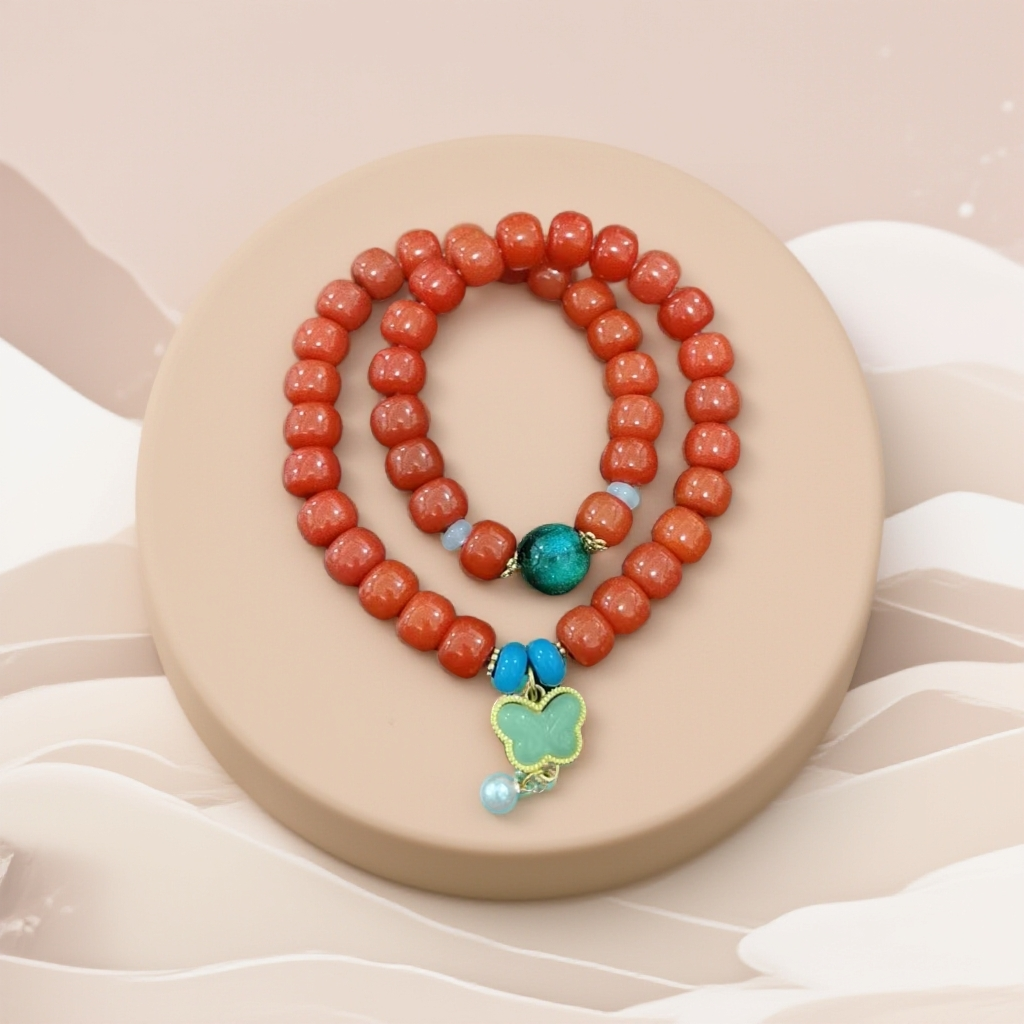 JG0063-红菩提双圈蝴蝶吊坠