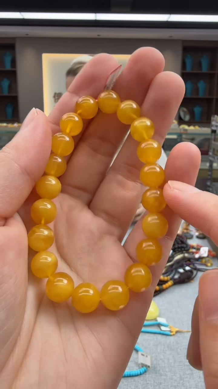 未镶嵌琥珀手链34秒拍号 假一罚三