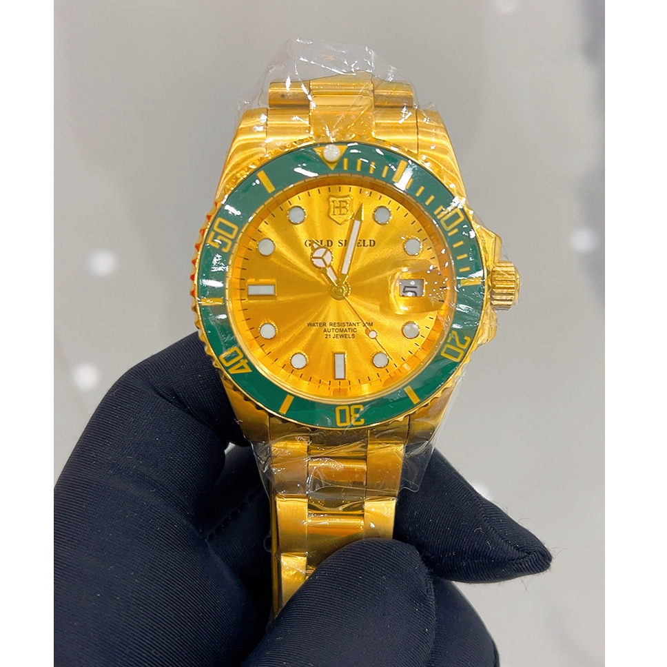 梅/地/卡/伦黄金劳时尚腕表手表金色