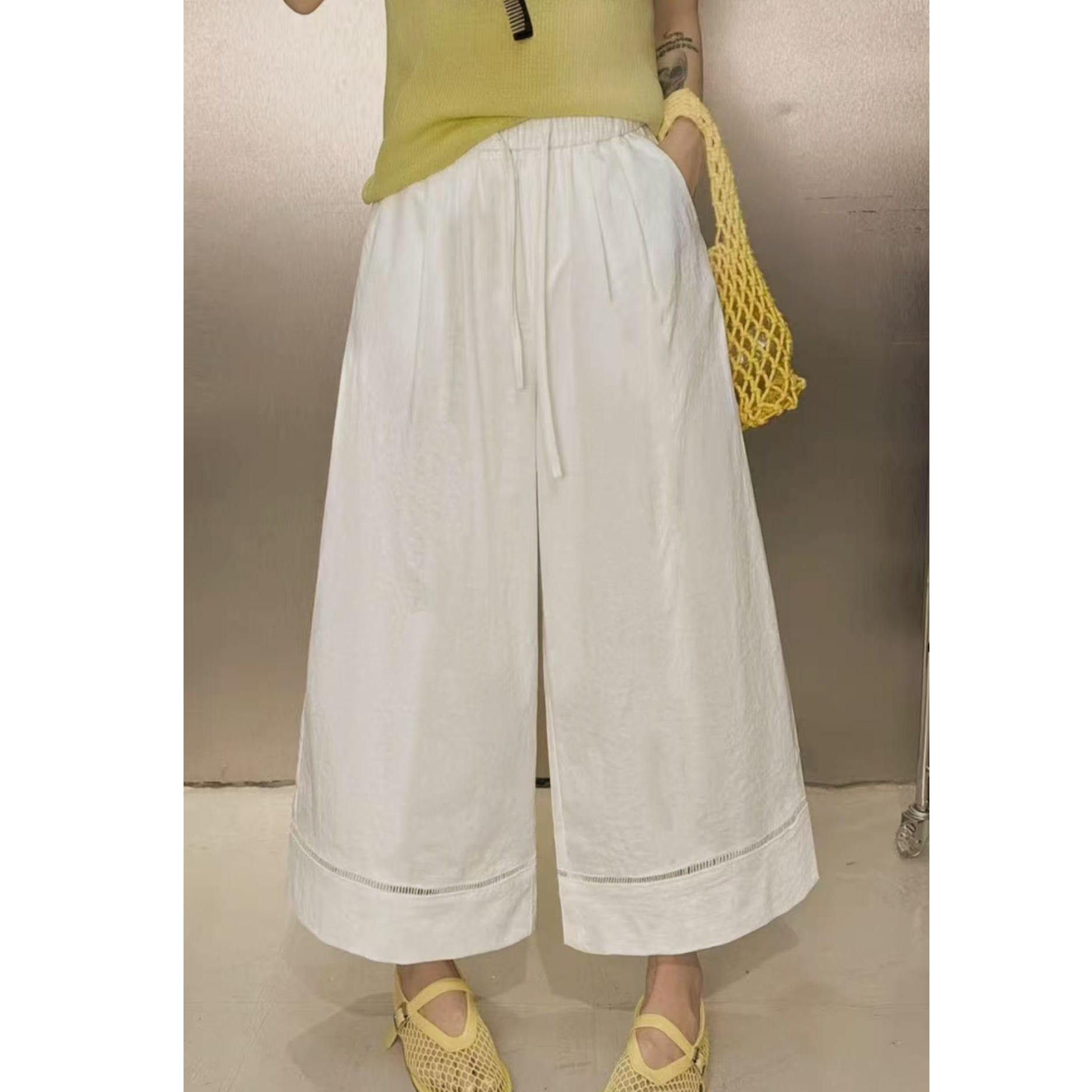 K1126米绑带拼蕾丝镂空休闲裤