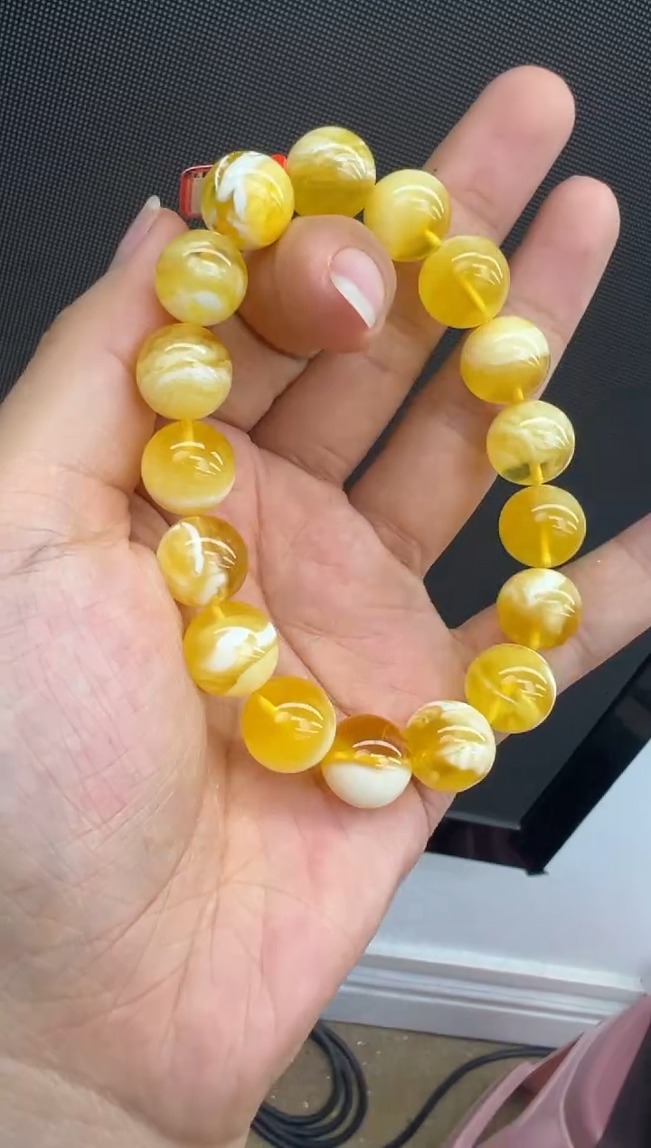 未镶嵌琥珀手链23秒拍号假一罚十