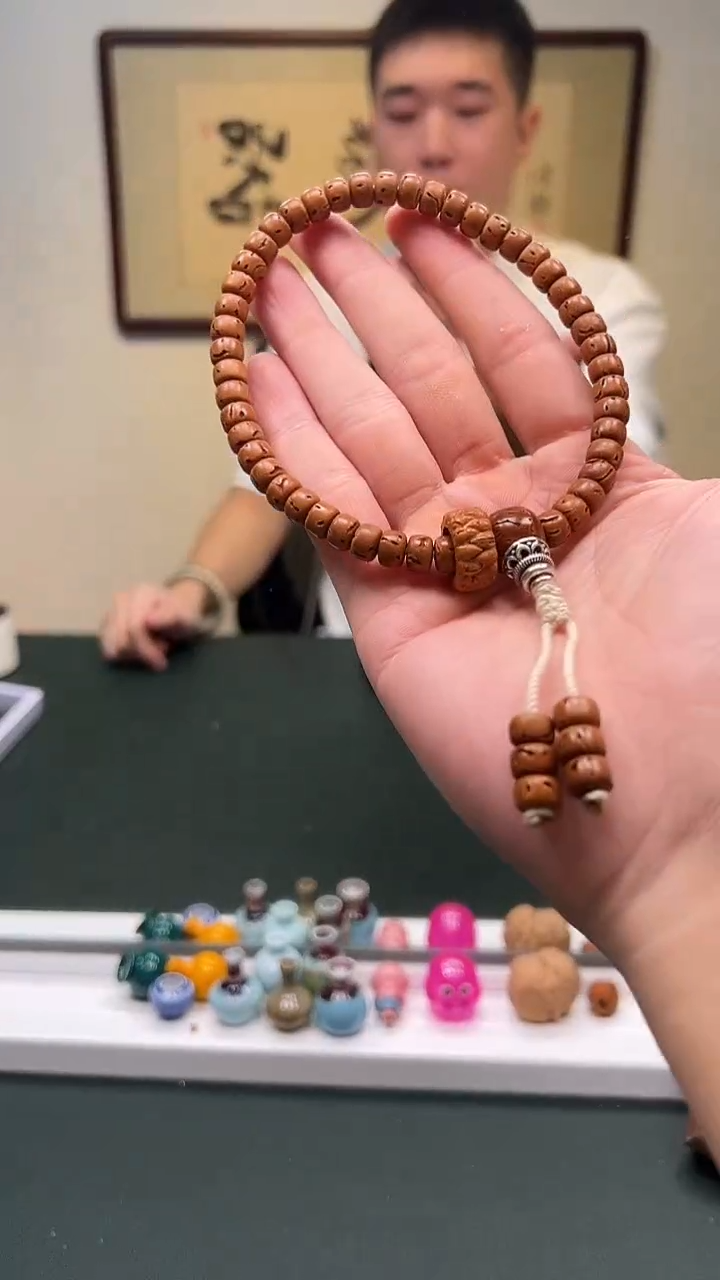 手串桃核好*7mm+设计款桃核手持