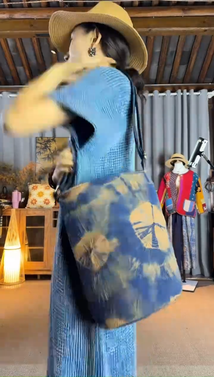 设计师款咖蓝扎花水桶包包