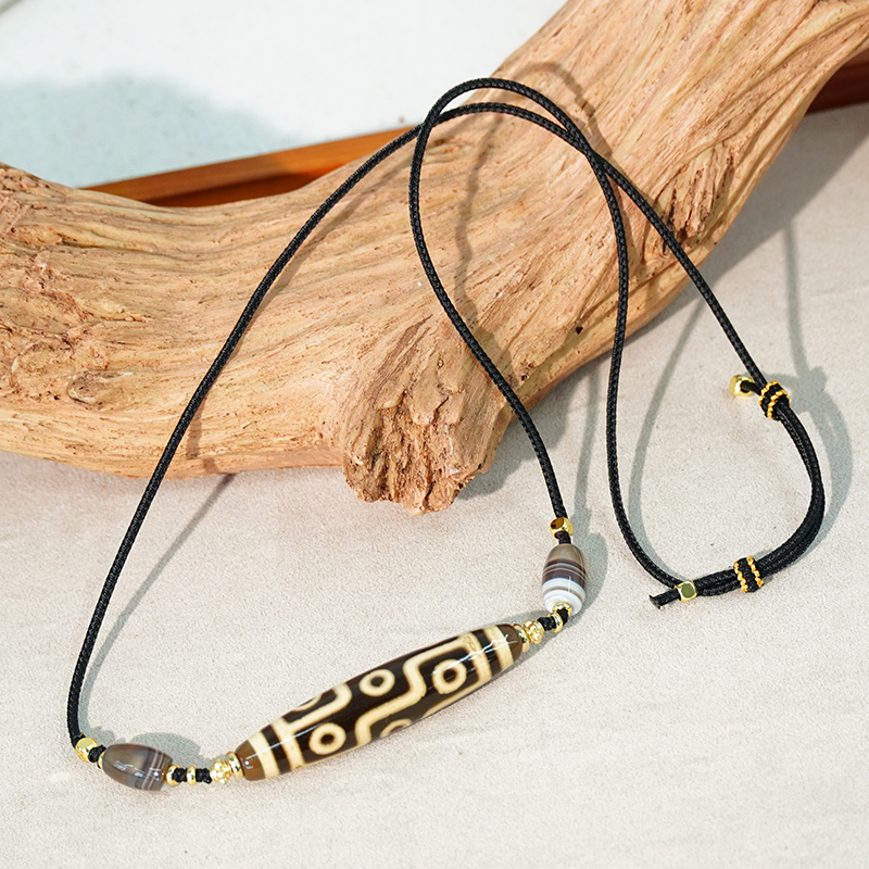 TZ920牙黄折线九眼藏风图腾文创吊坠（多样性发货，发其一）