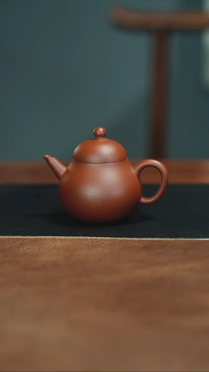 茶壶紫砂小煤窑生砂朱泥半手工剑流梨形85CC内推完美