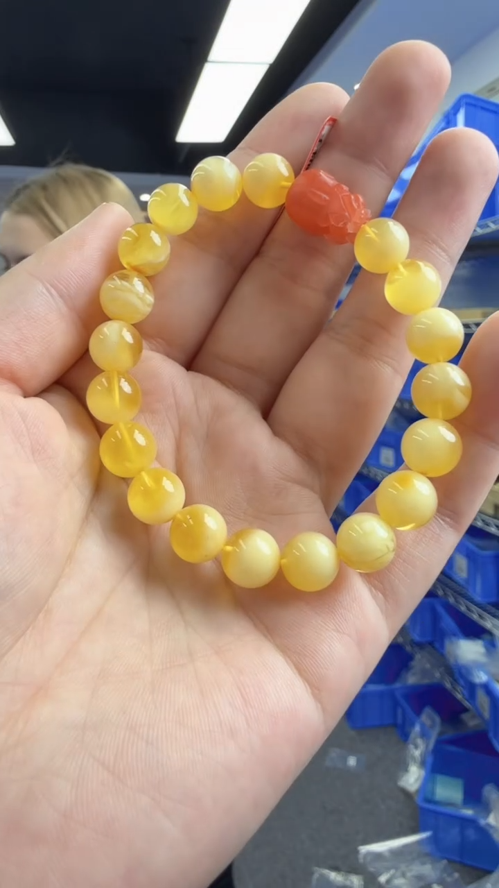 未镶嵌琥珀手链12秒拍号 假一罚三